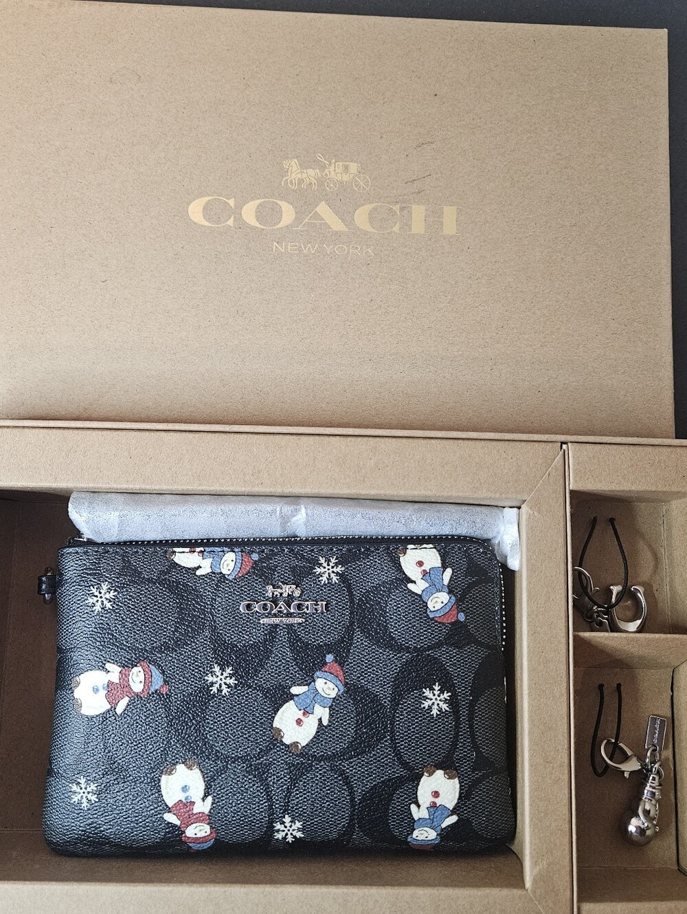 COACH New York Black Snowman Print Zip Wristlet
